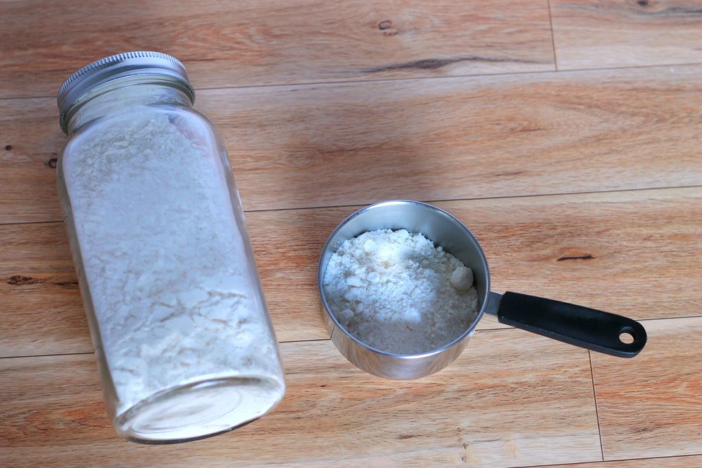 Bisquick mix in mason jar on table.