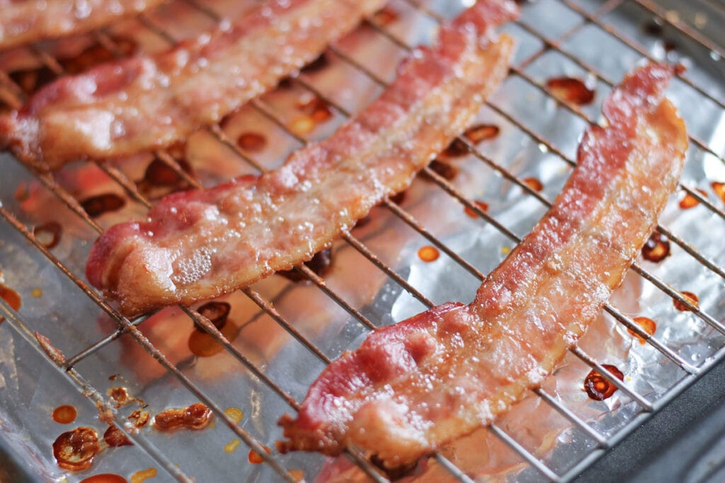 Crispy bacon on foil lined baking sheet.